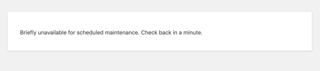 “Briefly unavailable for scheduled maintenance. Check back in a minute.” (WordPress Maintenance Mode Screenshot)